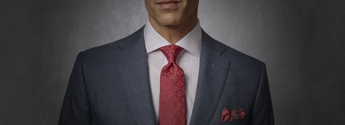 Tom james case study Cover image of man dressed in suite and red tie