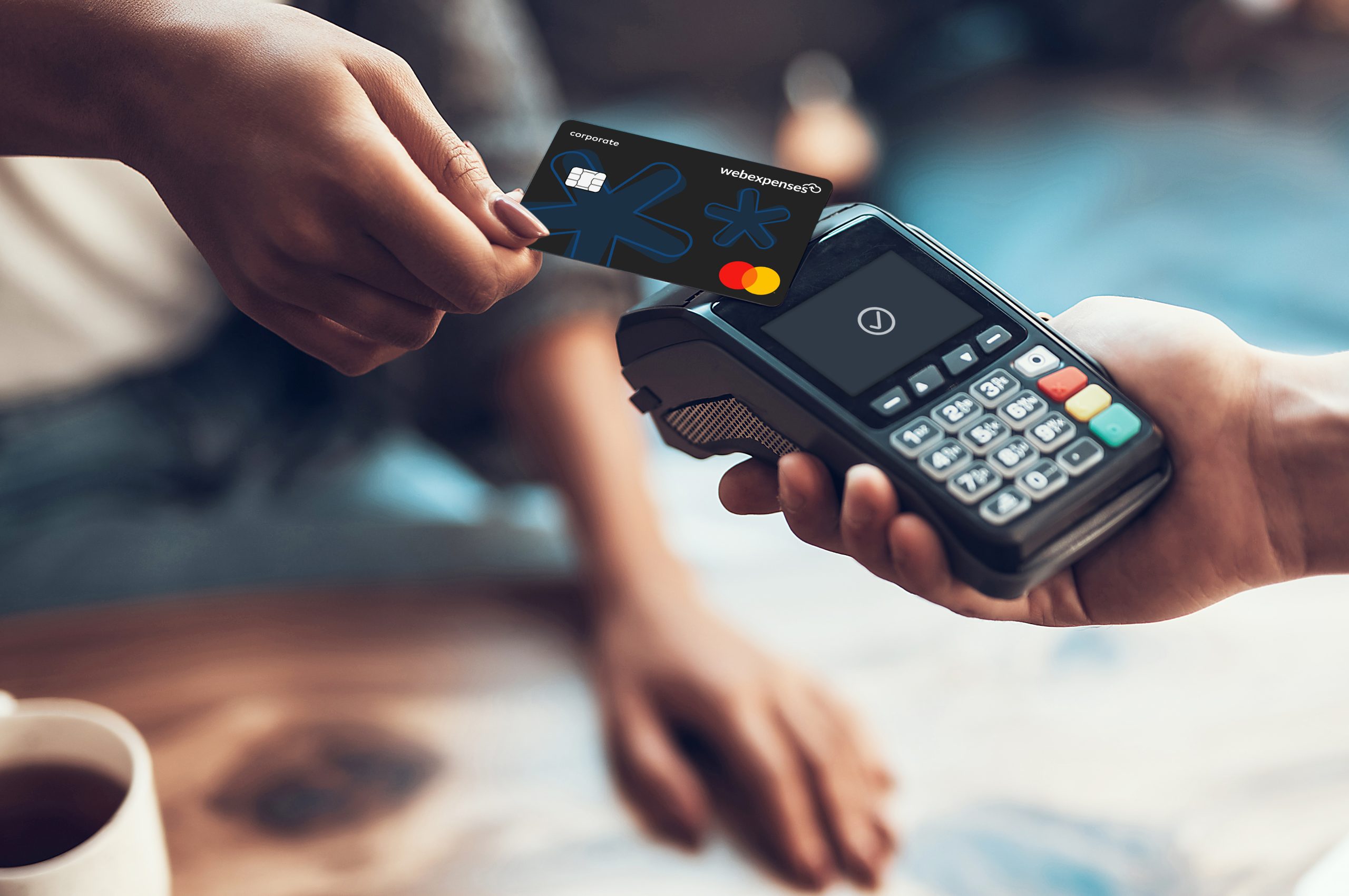 Person using Webexpenses Expense Card on an Adyen card reader