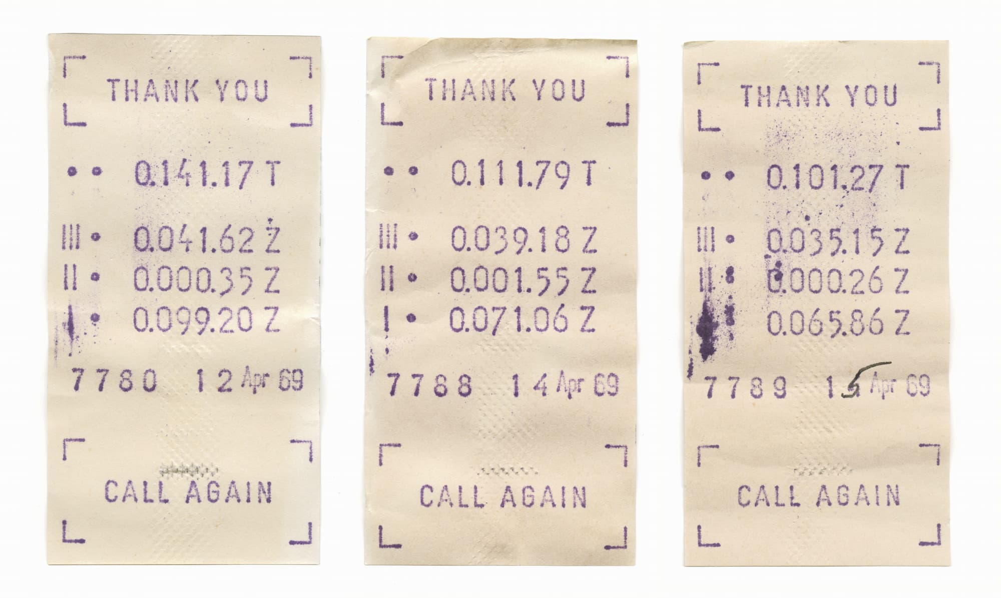 A line up of old receipts for a items bought in a store.